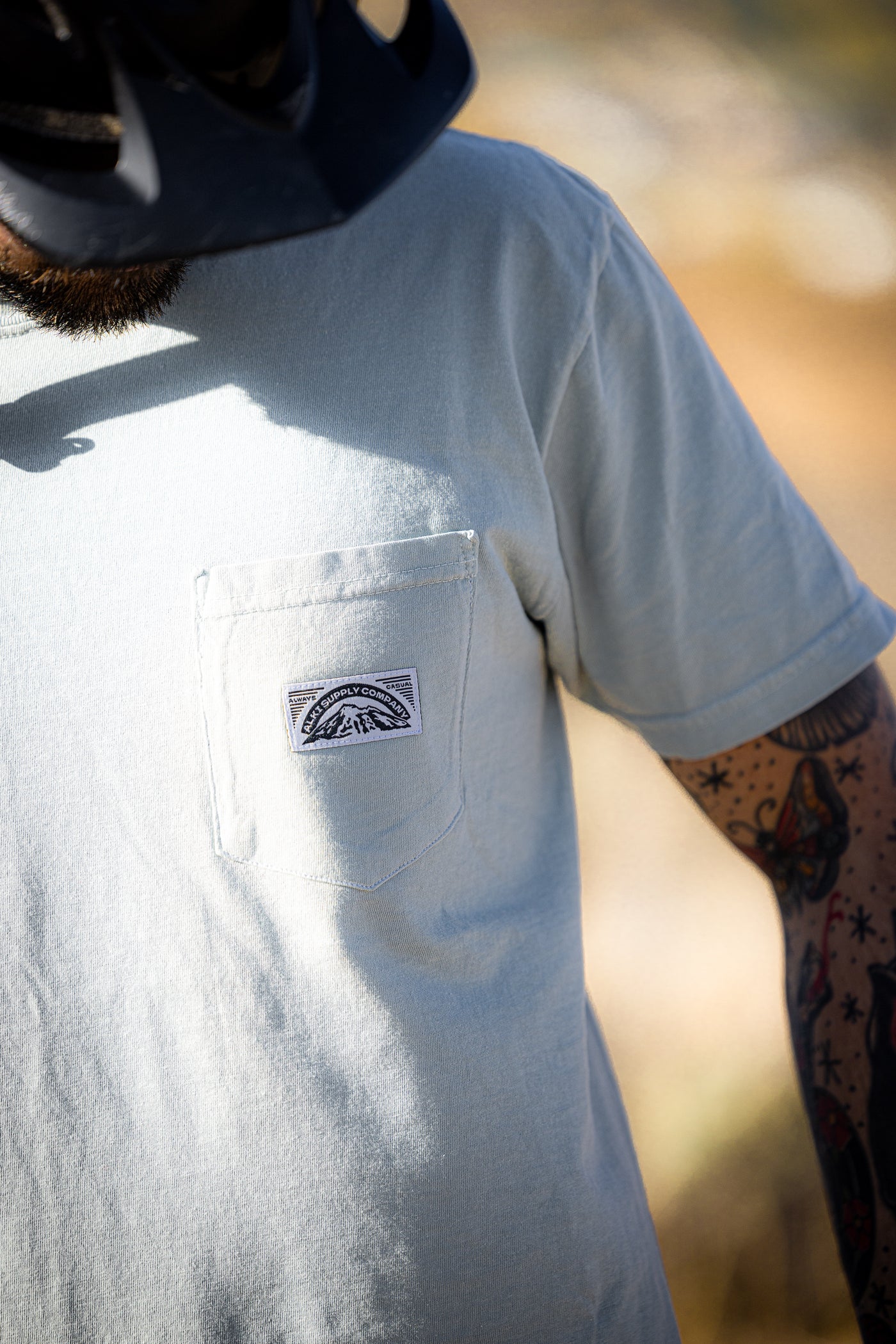 Banner Pocket Tee