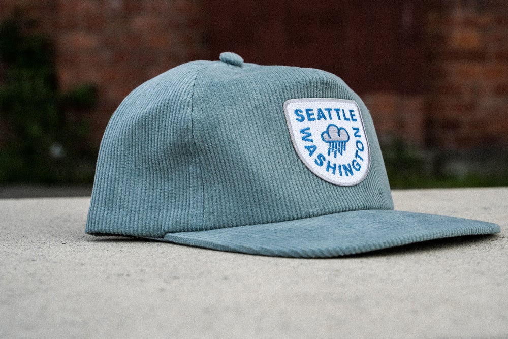 pnw hat, light blue raincloud corduroy snapback Seattle hat