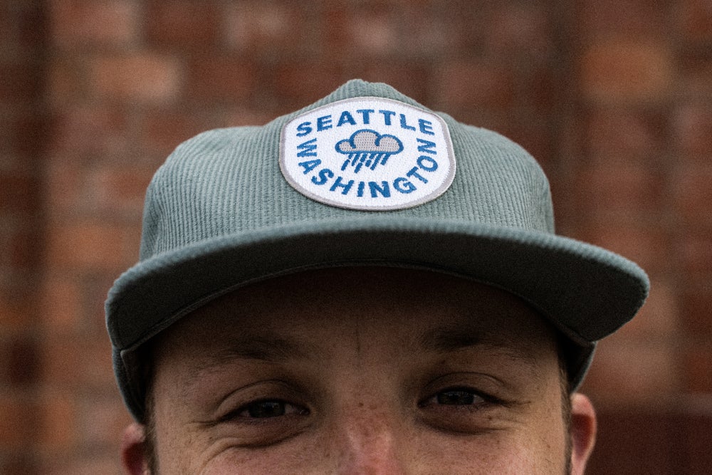 pnw hat, light blue Seattle raincloud corduroy snapback hat